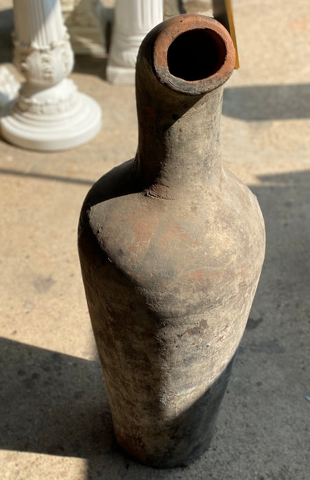 TALL TERRACOTTA JUG WITH CARVED SPOUT