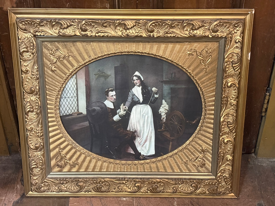 ORNATE OVAL GILT FRAMED PILGRIM COUPLE PRINT