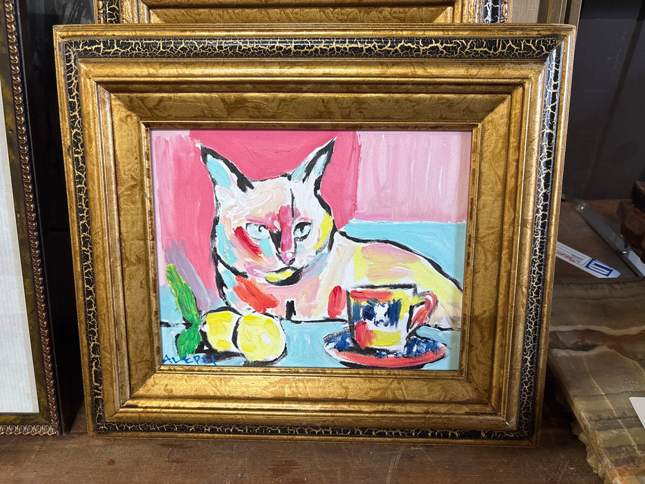 BLACK CRACKLE GOLD FRAMED PAINTING OF CAT AT TEA TABLE - SIGNED ALEPH