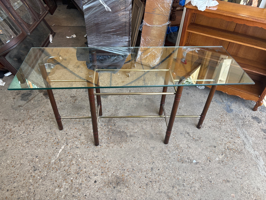 MIDCENTURY MCGUIRE WOOD, BRASS, AND RAW HIDE CONSOLE TABLE WITH GLASS TOP