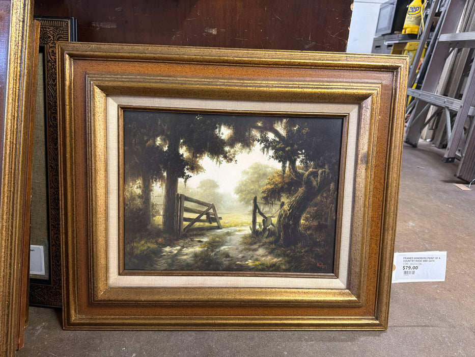 FRAMED WINDBERG PRINT OF A COUNTRY ROAD AND GATE