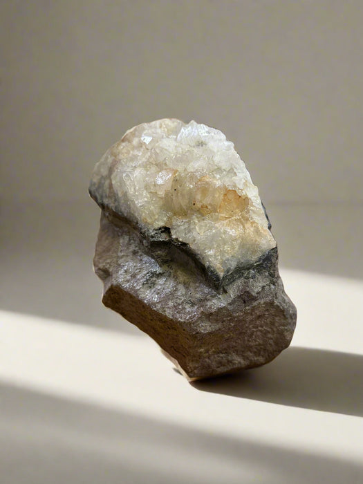 QUARTZ WITH DARK ROCK BASE