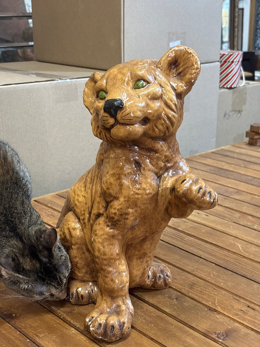 LION CUB STATUE WITH GREEN EYES