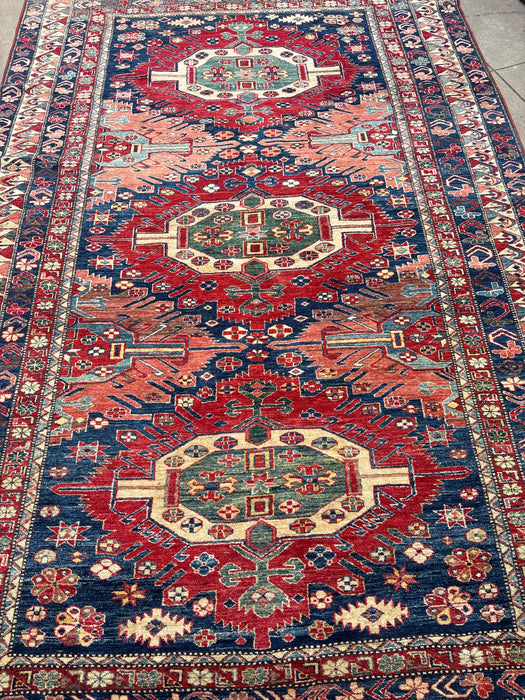 HAND TIED RED, BLUE AND GREEN PERSIAN RUG