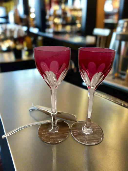 PAIR OF CRANBERRY CUT TO CLEAR CRYSTAL STEMMED CORDIALS