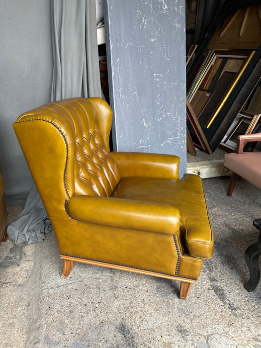 PAIR OF TUFTED LEATHE GOLDEN BROWN CHAIRS