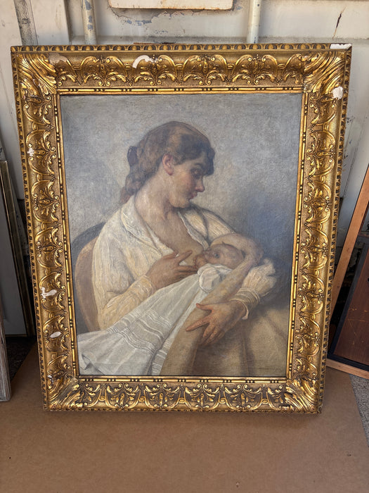 LARGE FOLIATE GILT FRAMED OIL PAINTING OF NURSING MOTHER - SIGNED HAVENMAN - AS FOUND