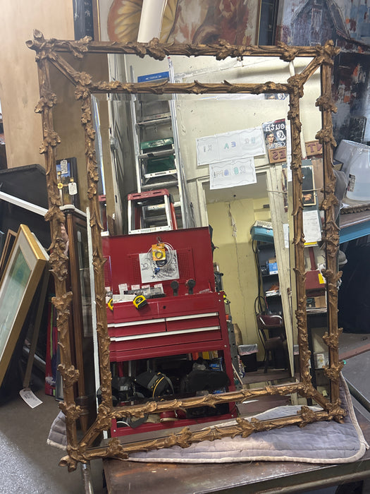 FRENCH GILTWOOD CARVED OAK LEAF MIRROR