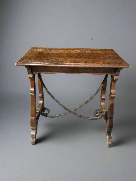 SPANISH BAROQUE OAK AND IRON SIDE TABLE