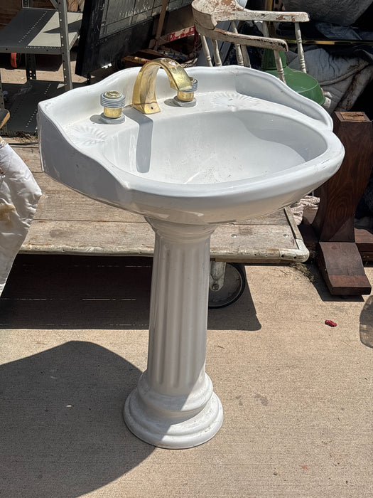 WHITE PEDESTAL SINK WITH GOLD FAUCET