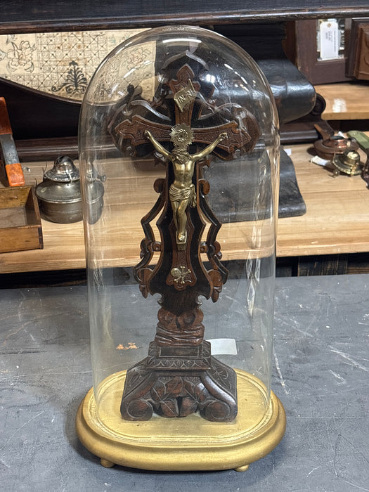 WOOD WITH BRASS CARVED CRUCIFIX UNDER DOME ON GOLD BASE