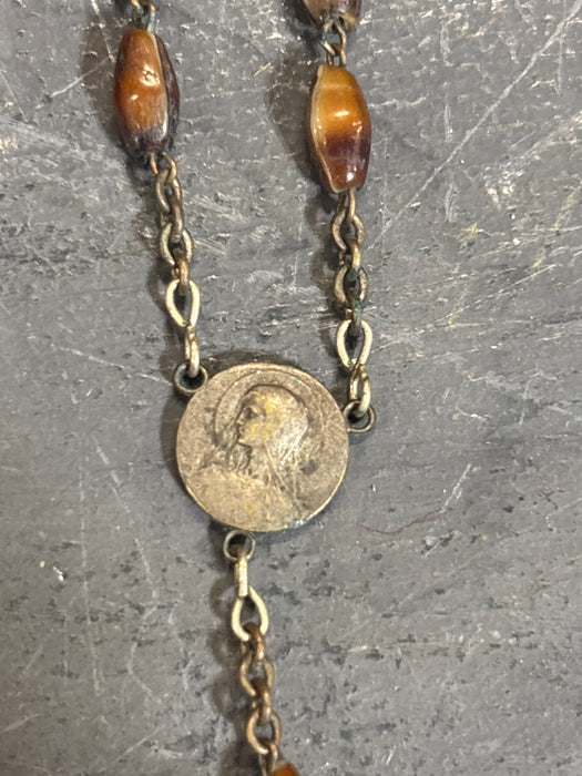 LIGHT BROWN AND SILVER ROSARY IN LEATHER CASE