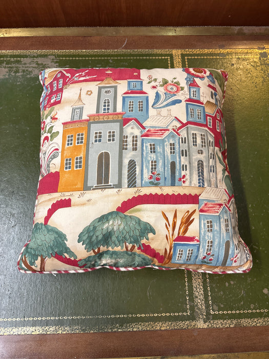 SMALL CITYSCAPE FABRIC PILLOW WITH RED AND WHITE STRIPES