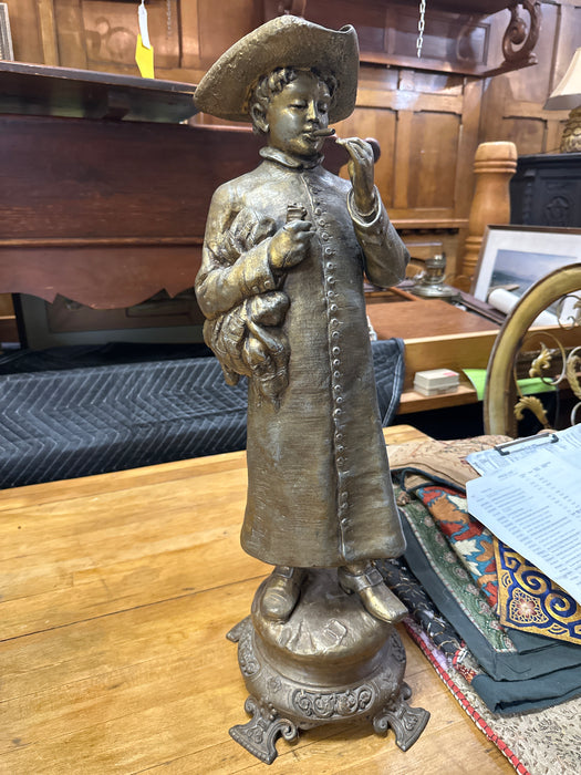 SPELTER STAUE OF A BOY SMOKING A CIGAR