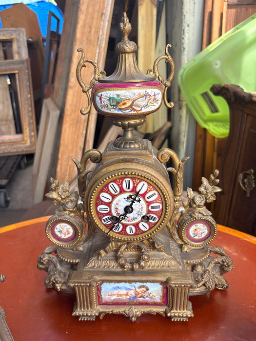 3 PIECE BRASS AND RED PORCELAIN GARNITURE CLOCK SET WITH CHERUBS