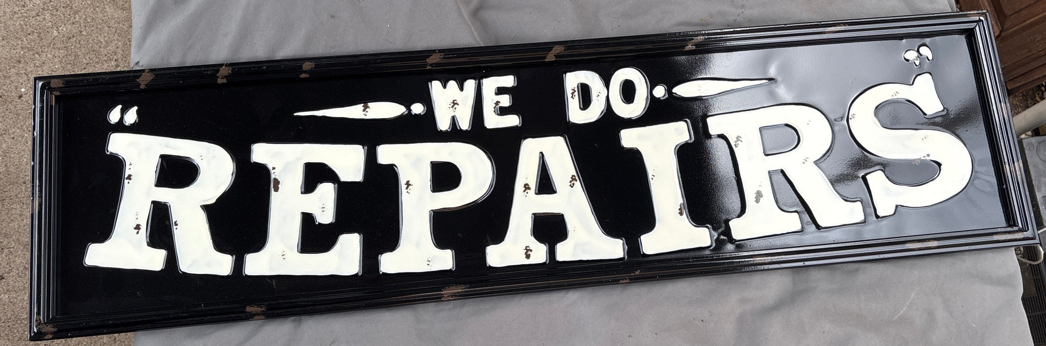 WE DO REPAIRS SIGN 1 OF 2
