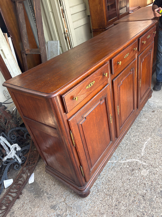 3 DOOR BRASS HANDLED PANELED OAK SIDEBOARD
