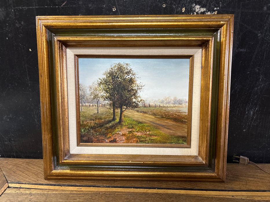 SMALL GREEN FRAMED OIL PAINTING ON BOARD OF TREES - SIGNED SHIRLEY DOWD