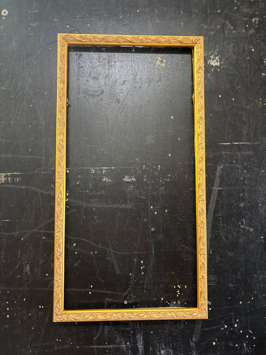 SOLD - LONG BRIGHT GOLD FRAME WITH FOLIATE DESIGN