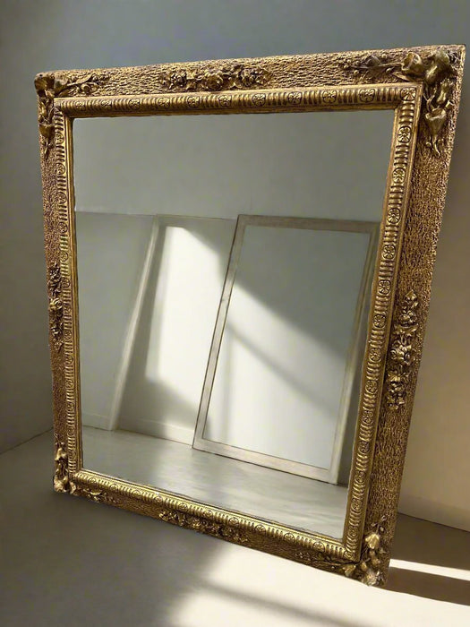 ANTIQUE GILT FRAMED BEVELED MIRROR