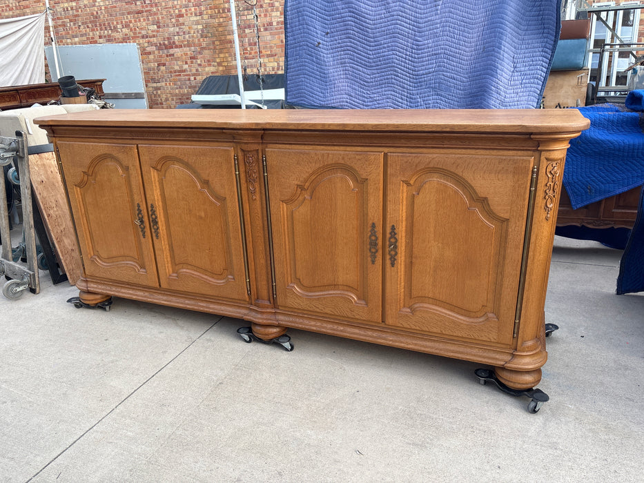 OAK SIDEBOARD WITH ARCHED DOORS AND BUN FEET