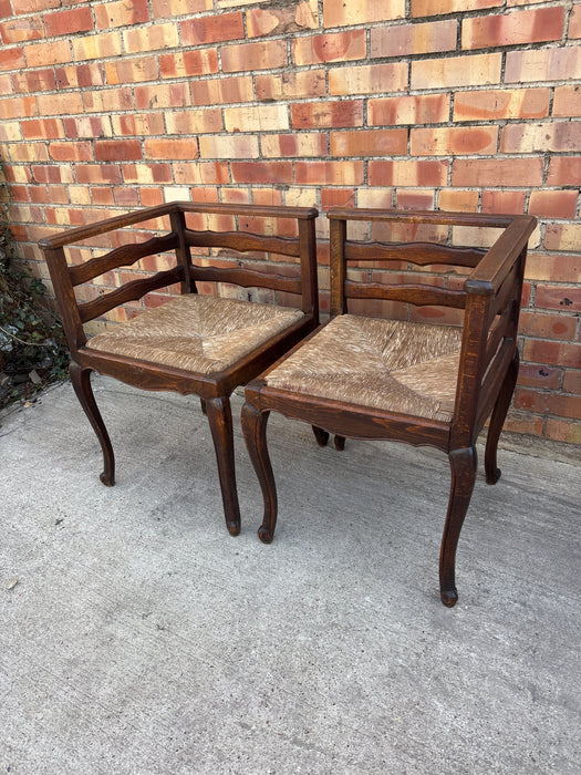 PAIR OF LOUIS XV LADDER BACK OAK RUSH CORNER CHAIRS