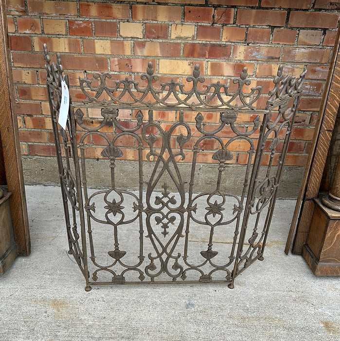 SMALL ORNATE CAST IRON FIRE SCREEN