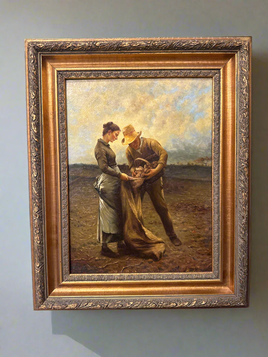 MAN AND WOMAN SACKING UP POTATOES