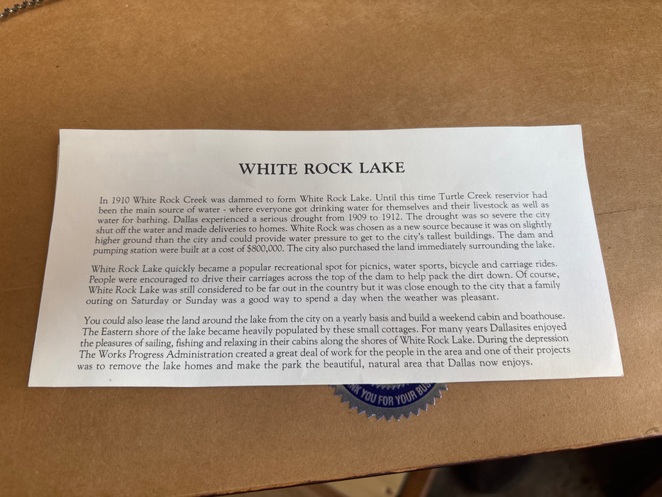 SMALL BROWN FRAMED PRINT OF WHITE ROCK LAKE - SIGNED L. GORDON