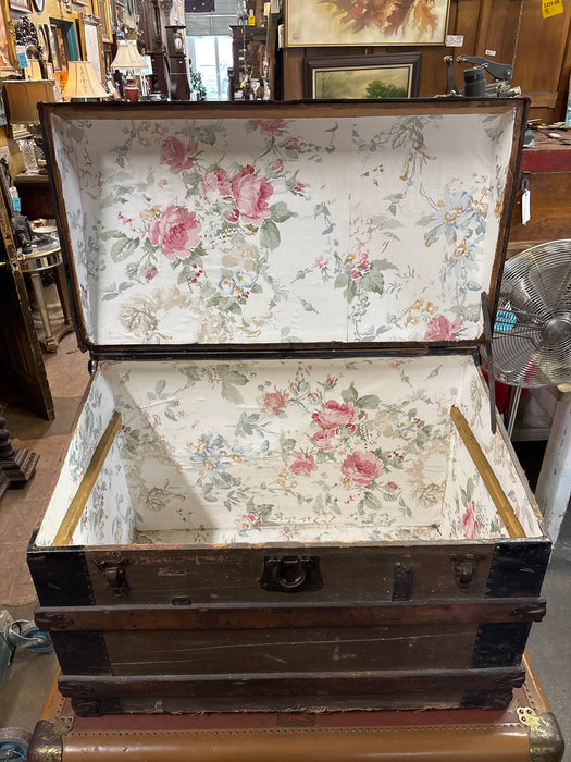 METAL SHIPPING TRUNK WITH WOOD STRAPS AND FLORAL LINED INTERIOR