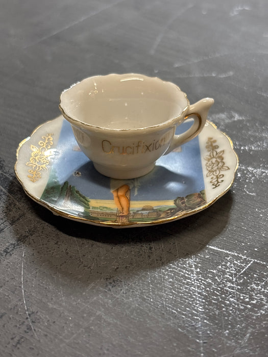 CRUCIFIXION CUP AND SAUCER