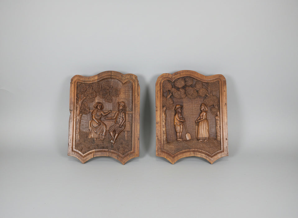 PAIR OF  SMALL CARVED FARM SCENE PANELS