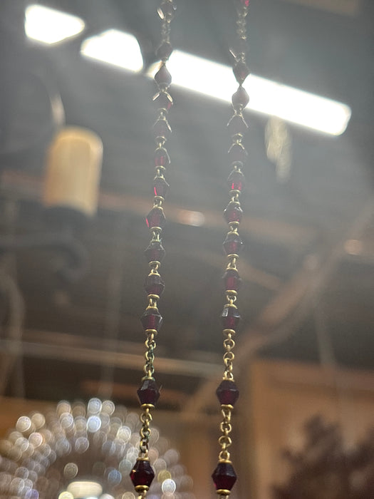 RED AND GOLD ROSARY IN WHITE CASE