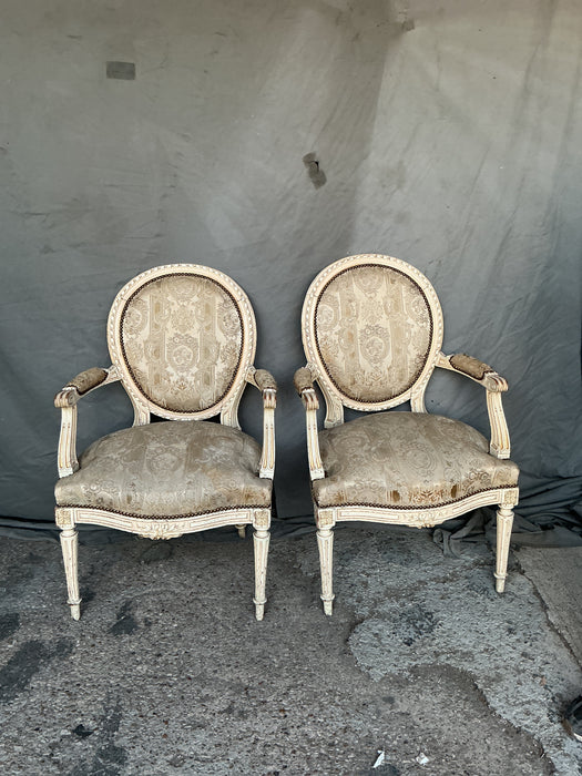 PAIR OF OVAL BACK PAINTED LOUIS XVI ARM CHAIRS