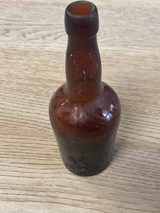 BROWN GLASS BOTTLE