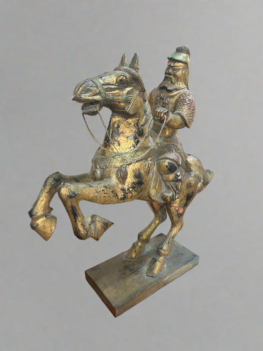 CARVED GILTWOOD STATUE OF A CHINESE HORSEMAN