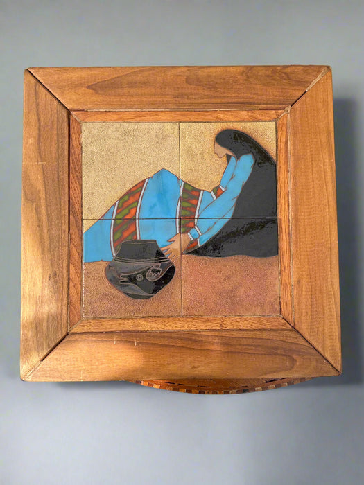 FRAMED TILE OF A WOMAN AND VASE