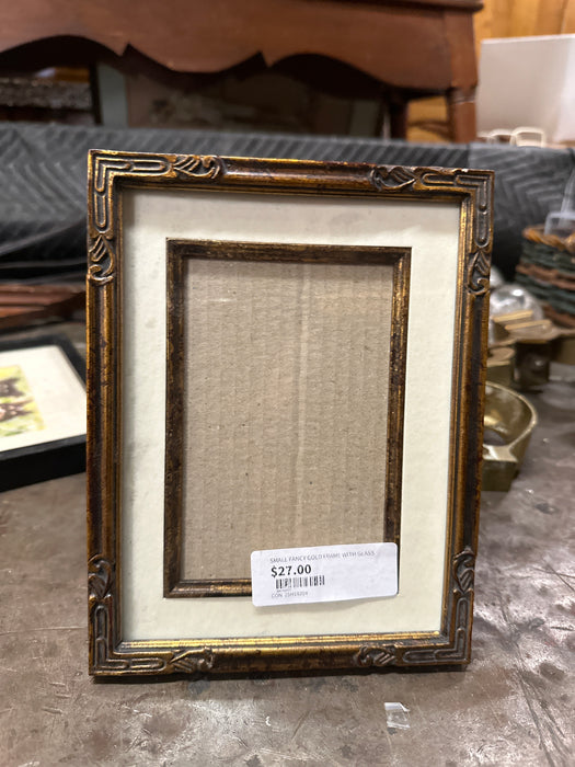 SMALL FANCY GOLD FRAME WITH GLASS