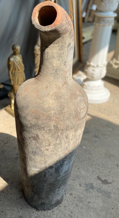 TALL TERRACOTTA JUG WITH CARVED SPOUT