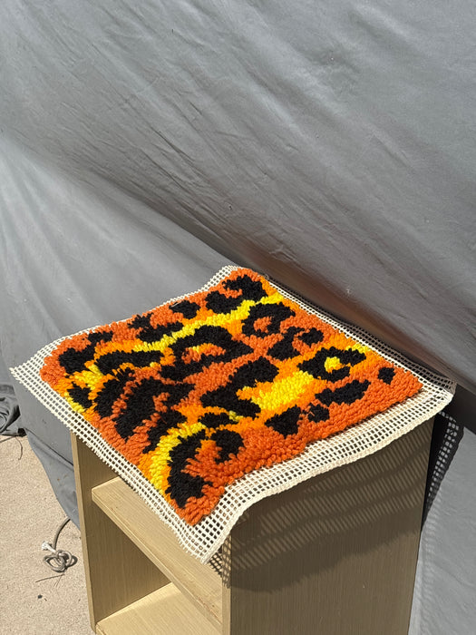 ORANGE AND YELLOW NEEDLEWORK PIECE