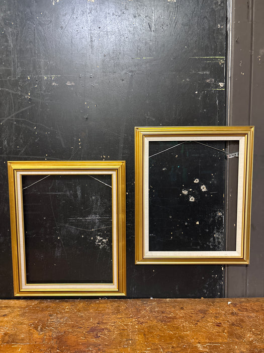 PAIR OF GILT FRAMES WITH GLASS AND LINEN FILET
