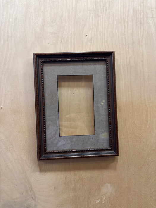 SMALL BROWN FRAME WITH BROWN MATTE