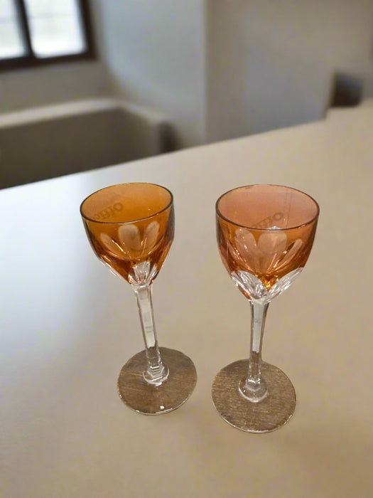 PAIR OF ORANGE CUT TO CLEAR CRYSTAL STEMMED CORDIALS