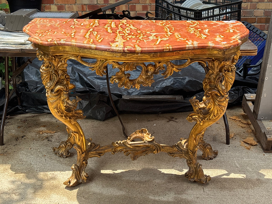CORAL COLORED MARBLE TOP GILT CONSOLE TABLE