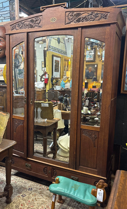 ART NOUVEAU OAK TWO DOOR ARMOIRE WITH GRAPE VINES