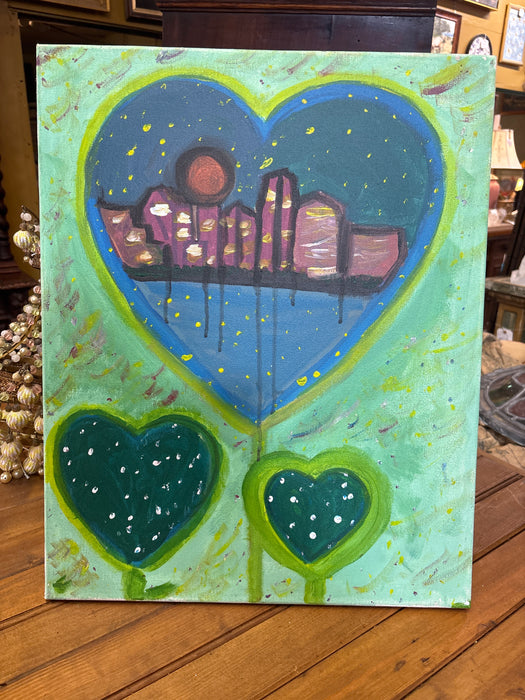 SMALL PAINTED CANVAS OF GREEN HEARTS WITH CITY SKYLINE