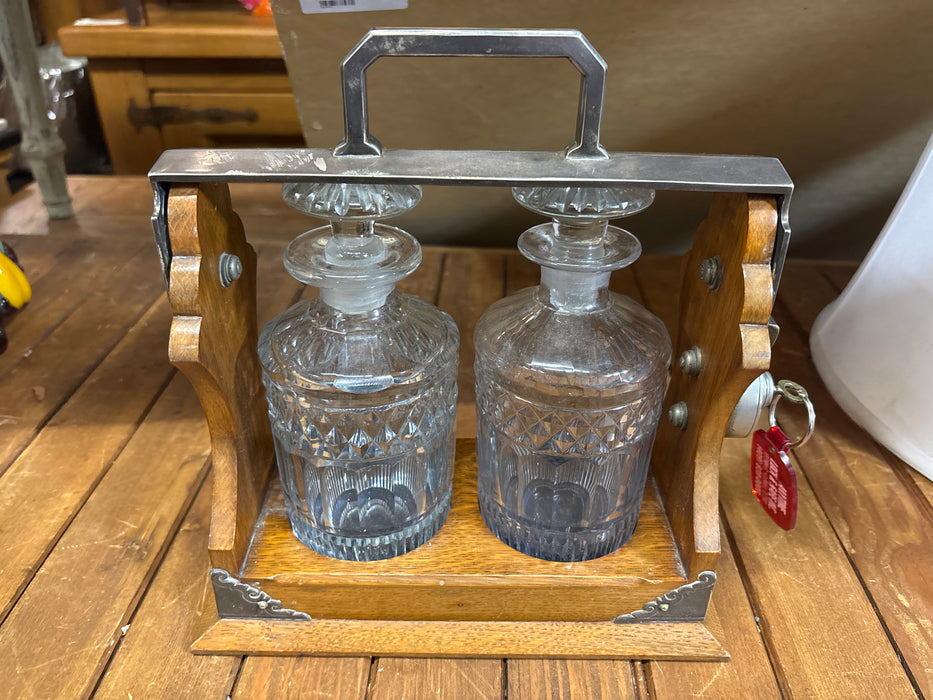 'THE TANTALUS' DECANTERS IN OAK CRADLE