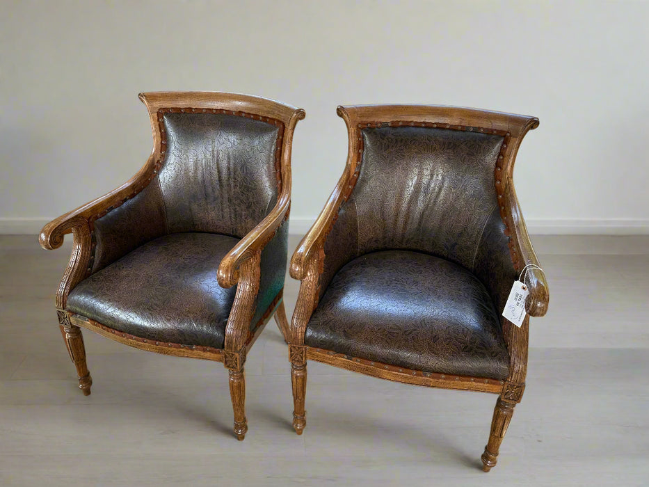 PAIR OF NOT OLD CHAIRS WITH COWHIDE TRIM