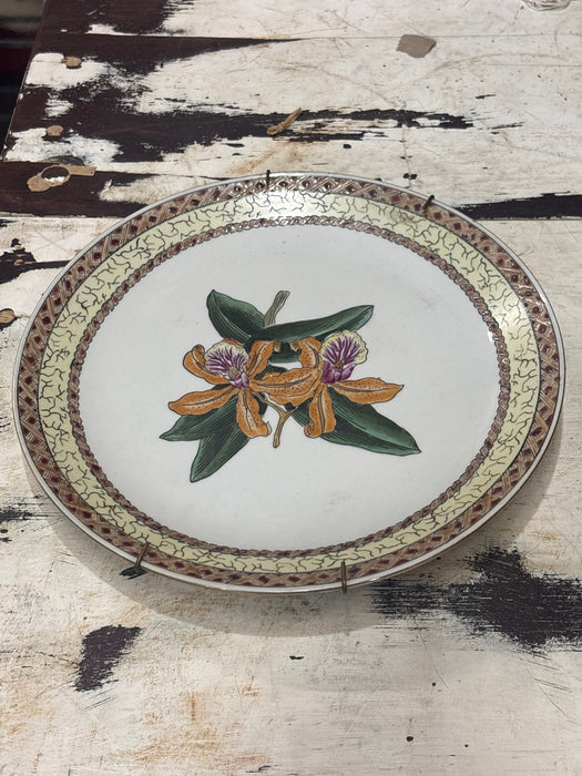 RED AND YELLOW CRACKLED PLATE WITH ORANGE FLOWERS