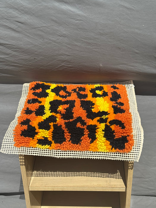 ORANGE AND YELLOW NEEDLEWORK PIECE